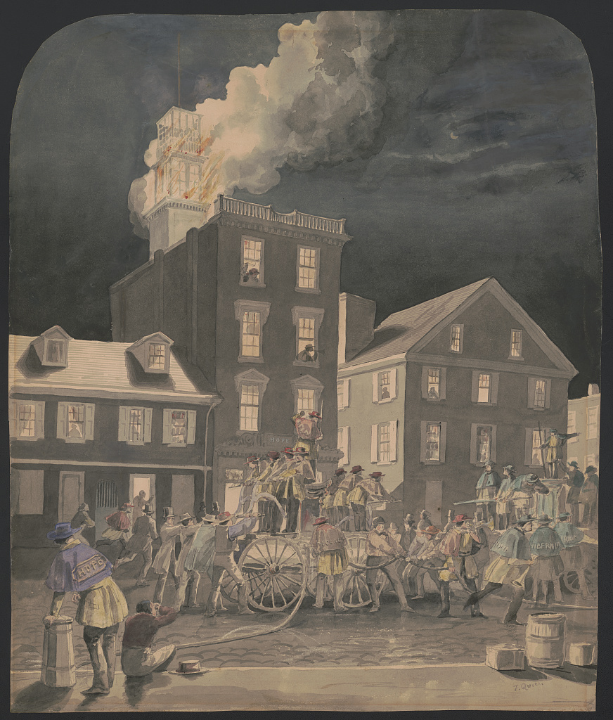 Drawing of a building on fire. There are people and firefighters gathered around in front of it.